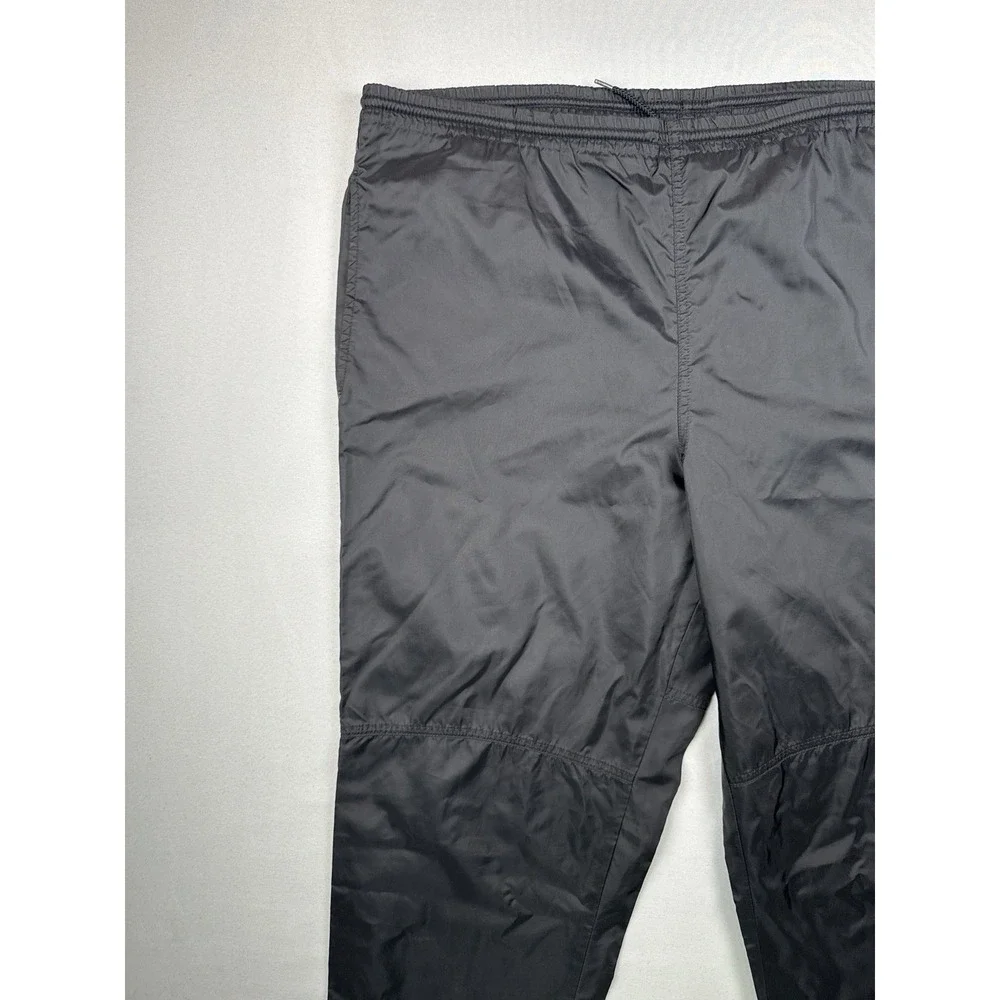 Vintage 90s Nike Black Nylon Track Pants Swoosh Zip Leg Windbreaker L